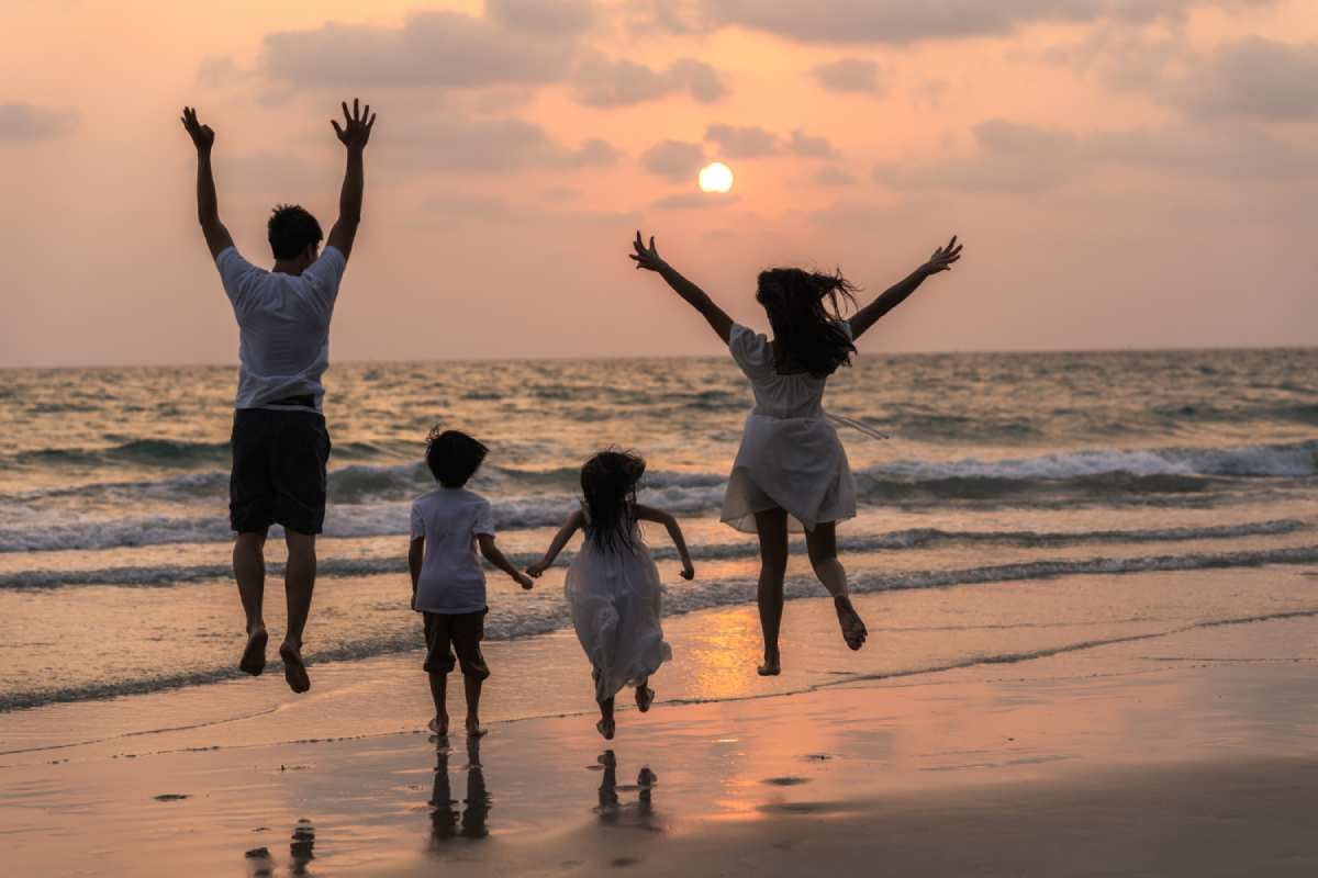 -happy-family-enjoy-vacation-beach